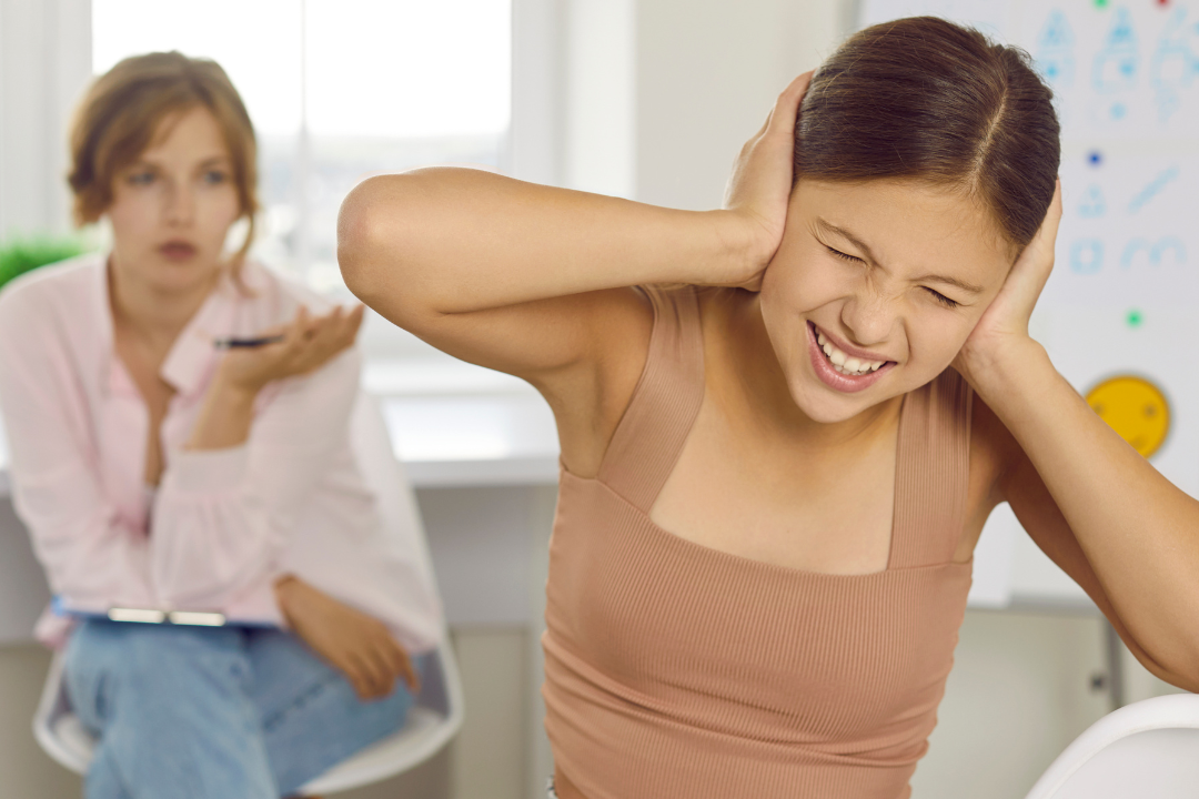 A concerned parent having a conversation with their teenager, symbolizing open communication about drug use.