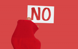 An individual confidently saying 'no,' symbolizing the empowerment that comes with setting personal boundaries.