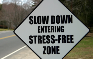 An individual practicing relaxation techniques in nature, symbolizing the journey to managing stress and achieving balance.