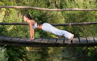 An individual enjoying a serene natural setting, symbolizing the restorative power of nature on mental well-being.