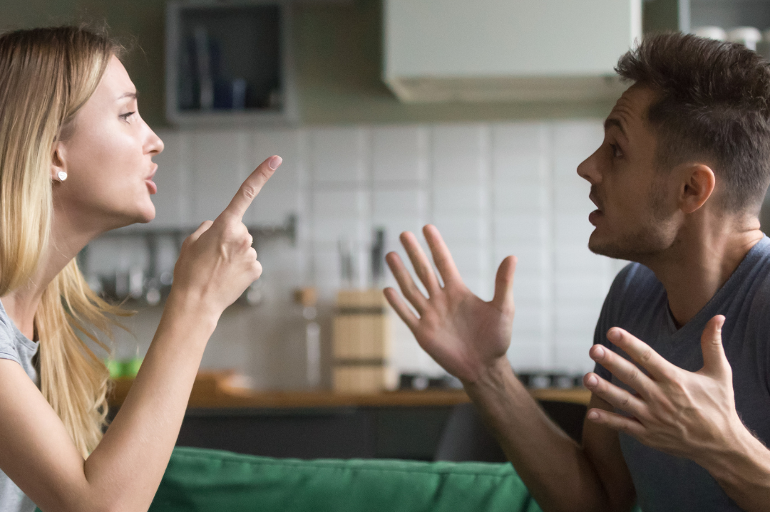 A couple engaging in open dialogue, symbolizing effective communication strategies in resolving conflicts.