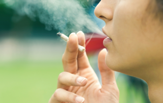 An adolescent contemplating cannabis use, symbolizing the mental health challenges associated with cannabis consumption in South Africa