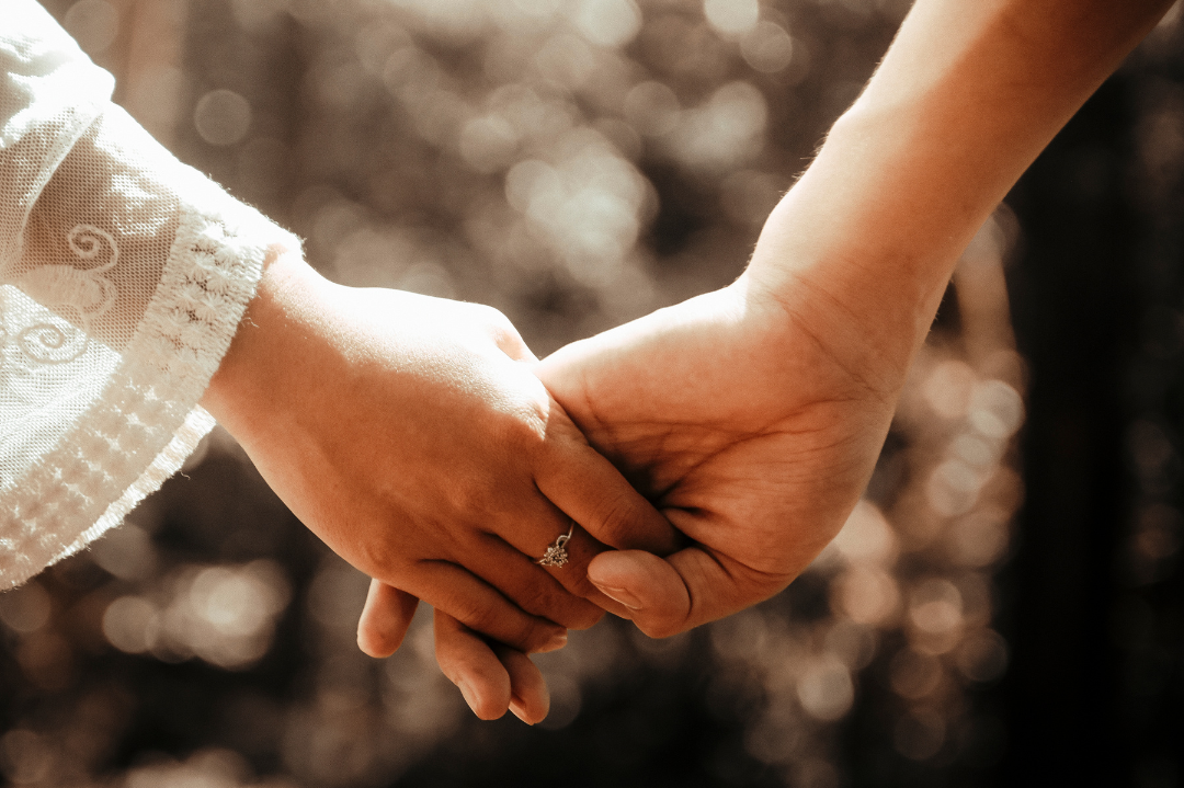 A couple engaging in open dialogue, symbolizing effective communication strategies in resolving conflicts.