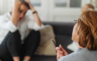 A therapist and client engaging in a session, symbolizing the exploration of transference and countertransference dynamics in therapy."