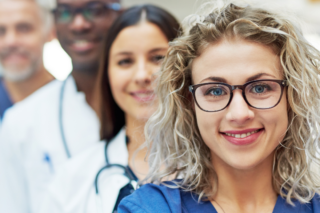 A healthcare professional practicing mindfulness, symbolizing the importance of self-care in the medical field.