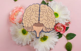 An individual painting on a canvas, symbolizing the therapeutic benefits of engaging in artistic activities for mental health.