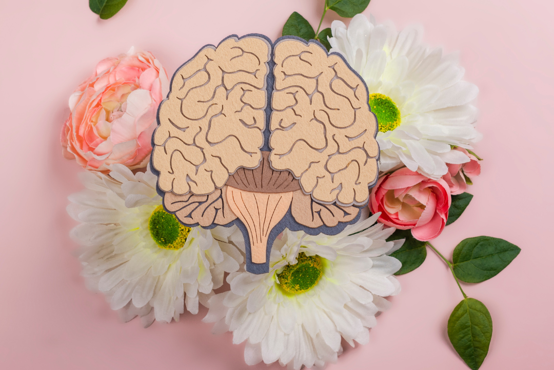 An individual painting on a canvas, symbolizing the therapeutic benefits of engaging in artistic activities for mental health.