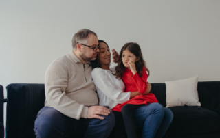 A supportive family embracing a neurodiverse member, symbolizing acceptance and empowerment in the journey of neurodiversity.
